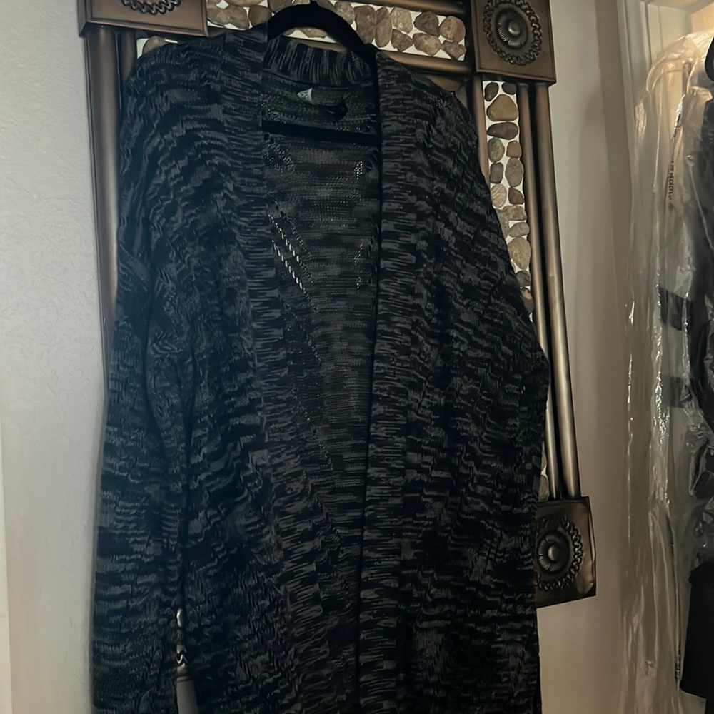 Long knitted sweater